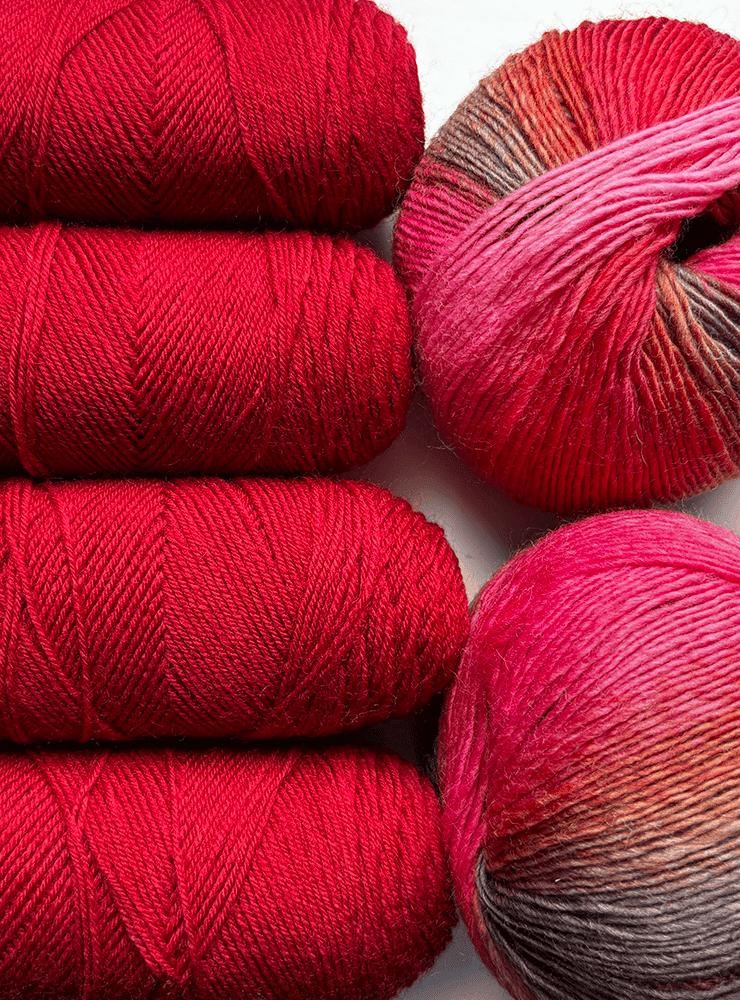 Jawoll 0061 og Mille Colori Baby 0085 i røde, orange og brunlige nuancer